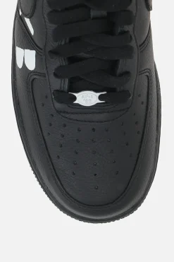 BLACK COMME des GARÇONS Air Force 1 sneakers in grainy leather