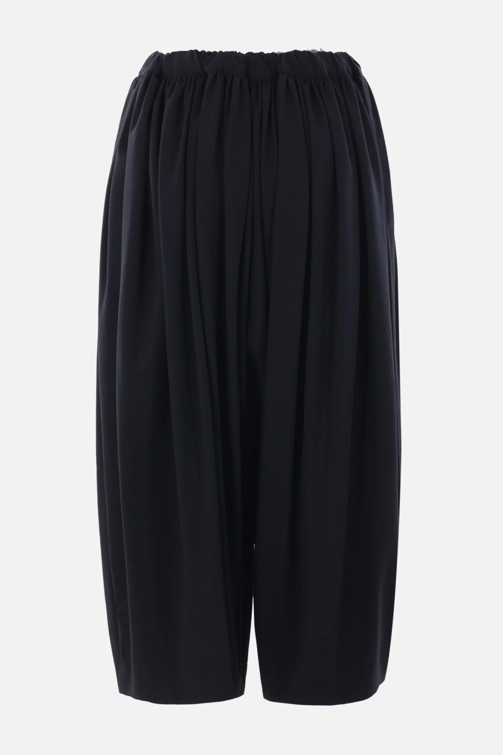 Women COMME DES GARÇONS balloon trousers in lightweight wool