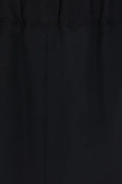 Women COMME DES GARÇONS COMME des GARÇONS crop trousers in lightweight pleated wool