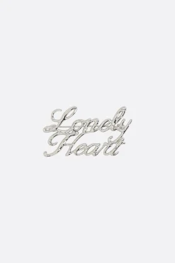 Women JIL SANDER Lonely Heart brass pin