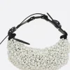 Women INNERRAUM Micro Half Moon handbag with pearls