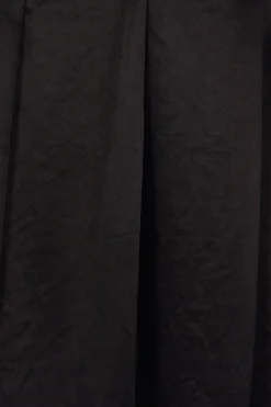 BLACK COMME des GARÇONS satin skirt with ruffles and cut-out details