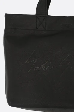 Women DISCORD YOHJI YAMAMOTO Signature mini tote bag in grainy leather