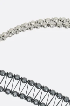 Women NOIR KEI NINOMIYA vest with metal spheres and safety pins