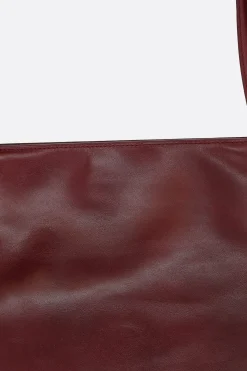 Women MAEDEN Yumi Sling handbag in glossy leather